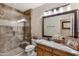 Bathroom with a glass shower, granite vanity, and decorative accents at 1971 E Yellowstone Pl, Chandler, AZ 85249