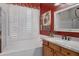 Bathroom with granite countertop, white cabinets and a soaking tub at 1971 E Yellowstone Pl, Chandler, AZ 85249