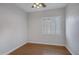Well lit bedroom featuring wood flooring and window shutters at 1971 E Yellowstone Pl, Chandler, AZ 85249