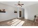 Bright bedroom with wood-look floors and plenty of natural light at 1971 E Yellowstone Pl, Chandler, AZ 85249