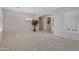 Spacious dining room with chandelier and carpet flooring at 1971 E Yellowstone Pl, Chandler, AZ 85249