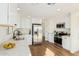 Updated kitchen, featuring stainless steel appliances and white cabinets at 20321 N 106Th Ave, Peoria, AZ 85382