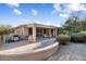 Covered patio with seating area and built-in grill at 21364 N Redington Point Dr, Surprise, AZ 85387