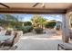 Covered patio with view of landscaped backyard at 21364 N Redington Point Dr, Surprise, AZ 85387