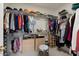 Large walk-in closet with ample shelving and hanging space at 21364 N Redington Point Dr, Surprise, AZ 85387