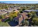 Aerial view of a single-story home with a terracotta roof in a residential area at 23335 N Country Club Trl, Scottsdale, AZ 85255