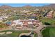 Aerial view of community with clubhouse, pool, and landscaping at 23335 N Country Club Trl, Scottsdale, AZ 85255