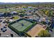 Aerial view of community amenities including tennis courts, clubhouse, and pool at 23335 N Country Club Trl, Scottsdale, AZ 85255