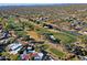 Aerial view of community with golf course and road at 23335 N Country Club Trl, Scottsdale, AZ 85255