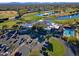 Aerial view of community clubhouse, pool, and parking lot at 23335 N Country Club Trl, Scottsdale, AZ 85255