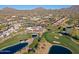 Aerial view of community features including golf course and clubhouse at 23335 N Country Club Trl, Scottsdale, AZ 85255