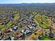 Aerial view of community homes and golf course at 23335 N Country Club Trl, Scottsdale, AZ 85255