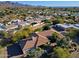 Aerial view of single-story home and neighborhood at 23335 N Country Club Trl, Scottsdale, AZ 85255