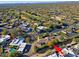 Aerial view of home, highlighting its location in a community with golf course at 23335 N Country Club Trl, Scottsdale, AZ 85255