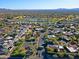Wide aerial view showing the community, golf course and distant mountains at 23335 N Country Club Trl, Scottsdale, AZ 85255