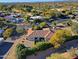 Aerial view showcasing the home's backyard and landscaping at 23335 N Country Club Trl, Scottsdale, AZ 85255