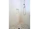 Modern shower with a frameless glass enclosure and geometric tile at 23335 N Country Club Trl, Scottsdale, AZ 85255