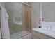 Bathroom with bathtub, double vanity, and decorative lamp at 23335 N Country Club Trl, Scottsdale, AZ 85255