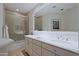 Bright bathroom with double vanity, walk-in shower, and ample counter space at 23335 N Country Club Trl, Scottsdale, AZ 85255