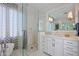Elegant bathroom with a walk-in shower and soaking tub at 23335 N Country Club Trl, Scottsdale, AZ 85255