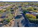 An aerial view of the community entrance and surrounding landscape at 23335 N Country Club Trl, Scottsdale, AZ 85255