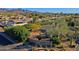 An aerial view of the community, including landscaping and signage at 23335 N Country Club Trl, Scottsdale, AZ 85255