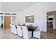 Elegant dining room with a large table and seating for eight at 23335 N Country Club Trl, Scottsdale, AZ 85255