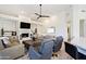 Spacious living room with fireplace and comfortable seating at 23335 N Country Club Trl, Scottsdale, AZ 85255