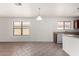 Bright dining area featuring neutral tile flooring, lots of natural light, and an open layout at 2716 W Allens Peak Dr, San Tan Valley, AZ 85144