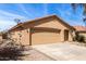 Single story house with a tile roof and two-car garage with low-maintenance landscaping at 2716 W Allens Peak Dr, San Tan Valley, AZ 85144