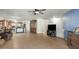 Open living space with views into kitchen, tile floors and ceiling fan at 2716 W Allens Peak Dr, San Tan Valley, AZ 85144
