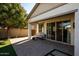 Backyard patio with seating area and access to the house at 3146 E Sagebrush St, Gilbert, AZ 85296