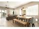 Open concept dining area with light floors and a stylish chandelier at 3146 E Sagebrush St, Gilbert, AZ 85296