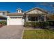 One-story home with a covered porch and attached two-car garage at 3146 E Sagebrush St, Gilbert, AZ 85296