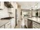 Modern kitchen with stainless steel appliances and white cabinetry at 3146 E Sagebrush St, Gilbert, AZ 85296