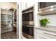 Well-organized pantry with ample shelving for storage at 3146 E Sagebrush St, Gilbert, AZ 85296