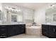 Spa-like bathroom with soaking tub and double vanity at 3170 S Nebraska St, Chandler, AZ 85248