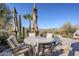 Outdoor patio furniture with mountain views at 37202 N Holiday Ln, Carefree, AZ 85377