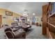 Open living room with ample natural light and built-in shelving at 3816 E Grove Ave, Mesa, AZ 85206