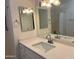 Bathroom with updated vanity and a large mirror at 5236 W Peorioa Ave # 137, Glendale, AZ 85302
