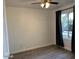 Spacious bedroom with large window and ceiling fan at 5236 W Peorioa Ave # 137, Glendale, AZ 85302