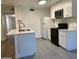 Modern kitchen with white cabinets and new appliances at 5236 W Peorioa Ave # 137, Glendale, AZ 85302
