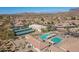 Community pool, tennis courts, and clubhouse at 5363 S Emerald Desert Dr, Gold Canyon, AZ 85118