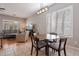 Casual dining area with wood table and four chairs at 5363 S Emerald Desert Dr, Gold Canyon, AZ 85118
