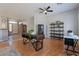 Dedicated home office space with wood flooring and built-in shelving at 5363 S Emerald Desert Dr, Gold Canyon, AZ 85118