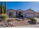 One-story house with tile roof, two-car garage, and desert landscaping at 5363 S Emerald Desert Dr, Gold Canyon, AZ 85118