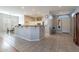 Kitchen with island, breakfast bar, and view of entryway at 5363 S Emerald Desert Dr, Gold Canyon, AZ 85118