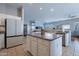 Spacious kitchen featuring an island, stainless steel appliances, and ample cabinet space at 5363 S Emerald Desert Dr, Gold Canyon, AZ 85118