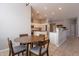 Bright kitchen with island and stainless steel appliances at 5363 S Emerald Desert Dr, Gold Canyon, AZ 85118