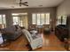 Spacious living room with hardwood floors, ceiling fan and ample seating at 5363 S Emerald Desert Dr, Gold Canyon, AZ 85118